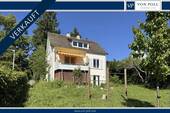 Titelbild - VERKAUFT: Charmantes Familienhaus mit Einliegerwohnung in Seesicht-Lage