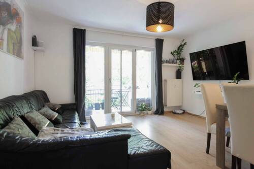 Wohnzimmer - 3 Zimmer Etagenwohnung zum Kaufen in Frankfurt am Main