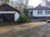 Garage und Hausansicht von der Straße.jpg - Einfamilienhaus mit 100,00 m&sup2; in Falkensee zum Kaufen