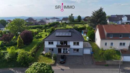 Bild 3 - 9 Zimmer Einfamilienhaus in Karlshausen