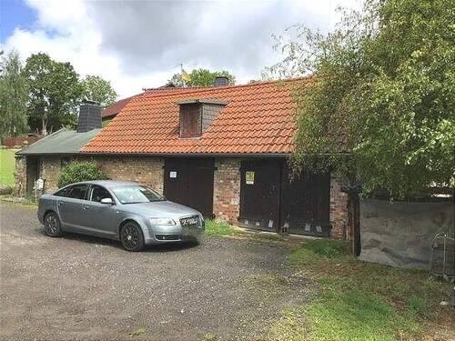 Stellplatz und Garagen - Einfamilienhaus mit 100,00 m&sup2; in Seegebiet Mansfelder Land zum Kaufen