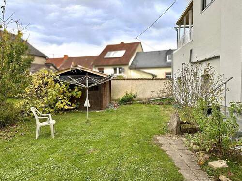 rückseitiger Garten - Mehrfamilienhaus, Wohnhaus mit 224,00 m&sup2; in Minderlittgen zum Kaufen