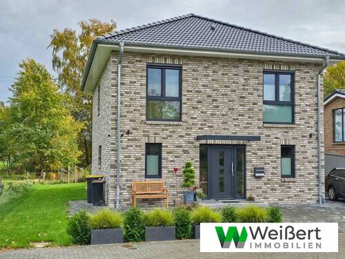 Beispiel-Abbildung mit Sonderleistung - Modern & stylisch wohnen auf zwei vollen Geschossen Niedrigenergiehaus EH40 -Neubauprojekt in Wacken