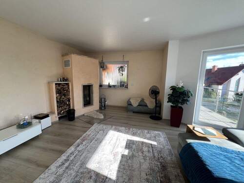 Wohnzimmer mit Kamin - 