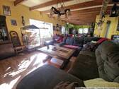 Wohnzimmer mit Blick in die Küche - Einfamilienhaus mit 207,00 m² in Limbach-Oberfrohna zum Kaufen