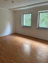 Wohnzimmer - Charmante 1-Zimmer-Wohnung im grünen Teil von Elmshorn - mit Gestaltungsspielraum! HHS 16