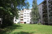 Hofansicht - Helle Erdgeschosswohnung mit Tageslichtbad
