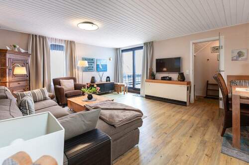 Wohnbereich - Komfortable Ferienwohnung mit Balkon und imposantem Blick auf Wattenmeer und Hafen