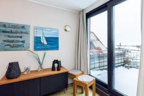 Wohnbereich und Balkon - Etagenwohnung mit 60,60 m&sup2; in Juist zum Kaufen