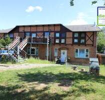 Mehrfamilienhaus in Hohenfelde mit Halle und Gewerberäumen