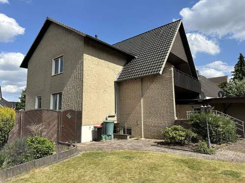 Gartenansicht - 7 Zimmer Einfamilienhaus zum Kaufen in Löhne