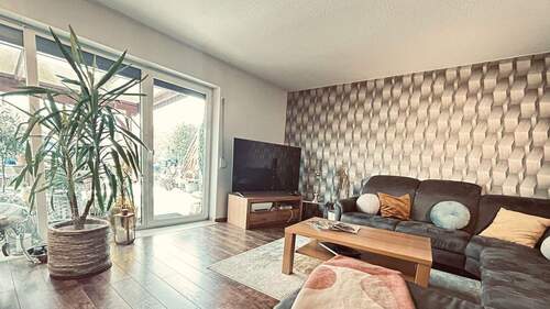 Wohnbereich mit Zugang zur Terrasse - 