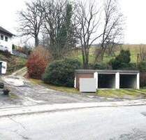 Drei, A 4-nahe, vermietete Garagen mit Grundstück in Gummersbach-Flaberg auf Auktion der Galundo GmbH zu verkaufen