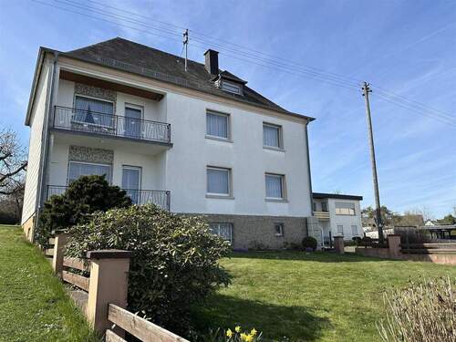 Bild 2 - 8 Zimmer Einfamilienhaus zum Kaufen in Mörschied