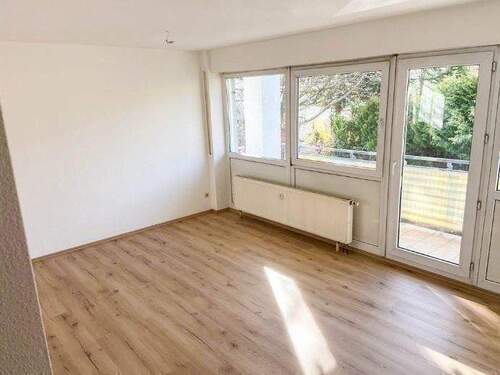 Beispielfoto - Wohnzimmer - Gemütliche 2-Zimmer-Wohnung mit Balkon und offener Wohnküche