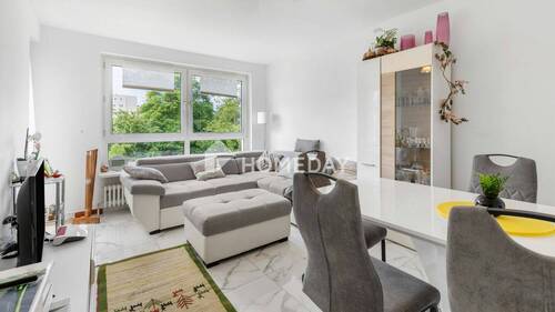 Wohnzimmer 1 - Wohlfühlen in Niederursel - Ihr neues Zuhause mit Balkon und Einbauküche