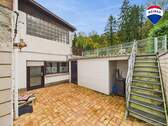 RE/MAX Immobilien DeLux Einfamilienhaus Körprich Terrasse - 