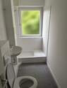 Badezimmer mit Dusche - 1 Zimmer Etagenwohnung in Elmshorn