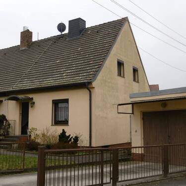 Seitenansicht incl. Garage - 4 Zimmer Doppelhaushälfte zum Kaufen in Lutherstadt Wittenberg