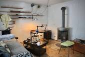 Wohnzimmer mit Ofen 1.OG - 