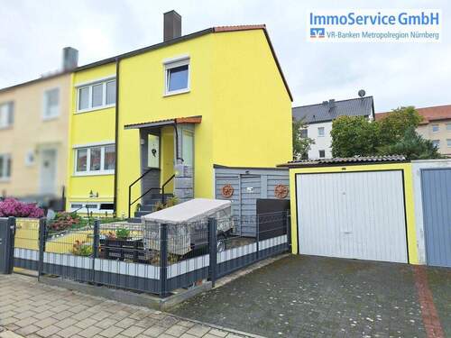 Außenansicht - Gemütliche Doppelhaushälfte mit Garten und Garage