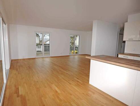 Wohnbereich - Moderne, lichtdurchflutete 3-Zimmer Wohnung mit Terrasse und Garten