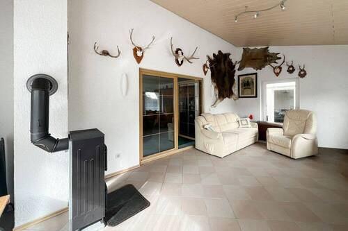 Wintergarten mit Blick ins Wohnzimmer - 