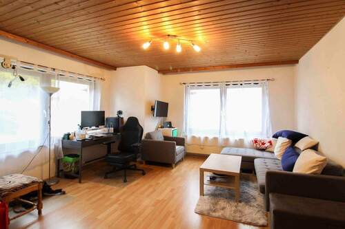 Wohnzimmer EG - 4 Zimmer Einfamilienhaus zum Kaufen in Ehringshausen