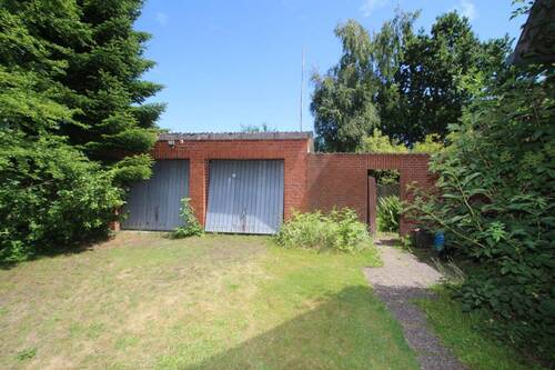 Die Doppelgarage - Mehrfamilienhaus, Wohnhaus mit 180,00 m² in Manhagen zum Kaufen