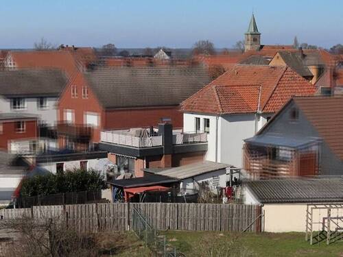 Seitenansicht - 8 Zimmer Mehrfamilienhaus, Wohnhaus zum Kaufen in Wunstorf