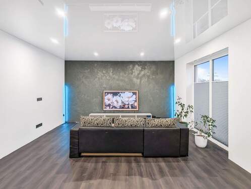 Haus 1 Wohnzimmer - Werz Immobilien - 