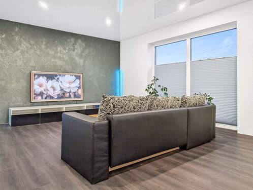 Haus 1 Wohnzimmer - Werz Immobilien - 