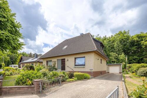 Ansicht - Grünes Glück Einfamilienhaus mit anliegendem Waldgrundstück