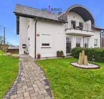 Stilvolle Wohnidylle mit Fernblick - Hochwertiges Einfamilienhaus mit Einliegerwohnung, Erdwärme und traumhafter Aussicht - Nusbaum