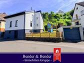 Objektansicht - Modernisiertes Einfamilienhaus mit Garten und Garage in guter Zentrumslage!