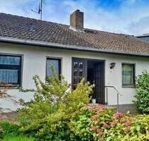 Familienfreundliches Reihenhaus mit großem Garten, 2 Garagen & Ausbaupotenzial in ruhiger Lage von Trebur-Astheim