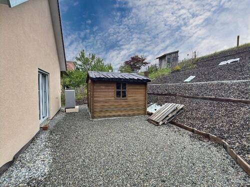 mit kleinem Gartenhaus - Einfamilienhaus mit 86,60 m&sup2; in Wangen zum Kaufen