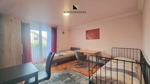 2. Schlafzimmer mit Balkonzugang 1.OG - 