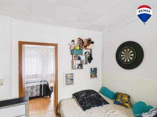 RE:MAXImmobilienDeLuxRodenSchlafzimmer - Reihenmittelhaus mit 75,00 m&sup2; in Saarlouis / Roden zum Kaufen