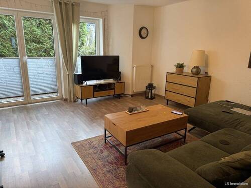 Wohnzimmer - 4 Zimmer Doppelhaushälfte zum Kaufen in Oldenburg / Ofenerdiek