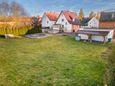 Gartenansicht - Einfamilienhaus mit 100,00 m² in Eschwege zum Kaufen