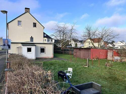 Giebelansicht - Mehrfamilienhaus, Wohnhaus mit 150,00 m&sup2; in Langenfeld zum Kaufen