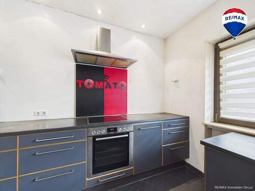 REMAX Immobilien DeLux Bungalow in Wadrill Küche - 