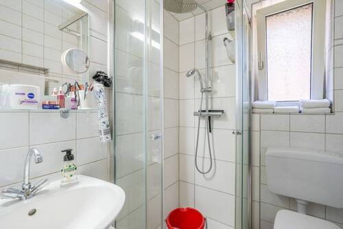 Badezimmer EG - Einfamilienhaus mit 90,00 m² in Düsseldorf zum Kaufen