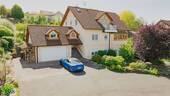 DJI_20250827144104_0338_D - Charmantes Einfamilienhaus mit Einliegerwohnung und Sonnenterrasse