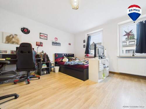 REMAX Immobilien DeLux Eigentumswohnung Kinderzimmer Schwalbach Mark Borowicz - 