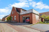 Hausansicht - Einfamilienhaus mit 110,00 m&sup2; in Krummhörn / Pilsum zum Kaufen