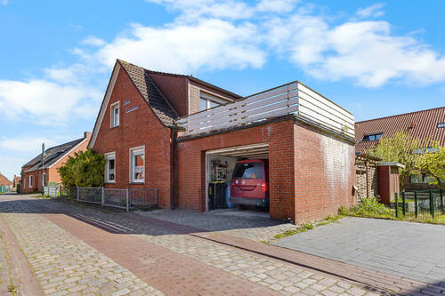 Hausansicht - Einfamilienhaus mit 110,00 m&sup2; in Krummhörn / Pilsum zum Kaufen