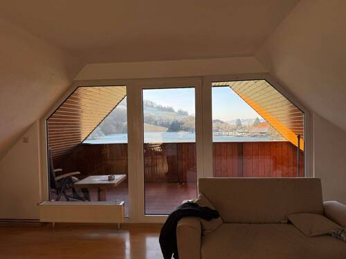 Wohnzimmer mit Balkon OG - 