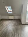 Wohnzimmer - Etagenwohnung mit 78,20 m&sup2; in Ronnenberg zur Miete